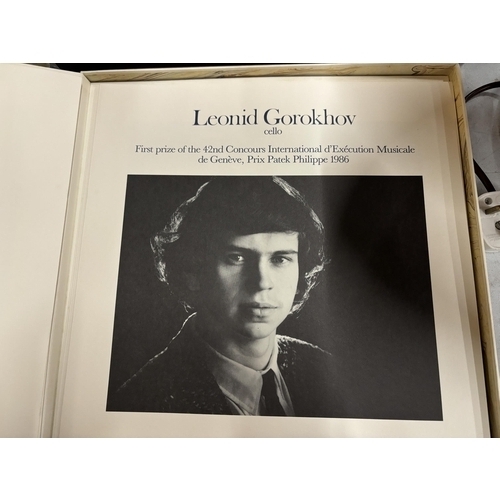 57 - A 150TH YEAR PATEK PHILLIPPE COMMEMORATIVE VINYL LPS - LE TEMPS ET LA MUSIQUE VINYLS IN A BLUE VELVE... 