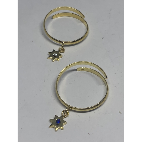 750 - FOUR MARKED SILVER GOLD PLATED RINGS