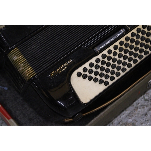 217 - A VINTAGE HOHNER ATLANTIC PIANO ACCORDIAN IN A CASE