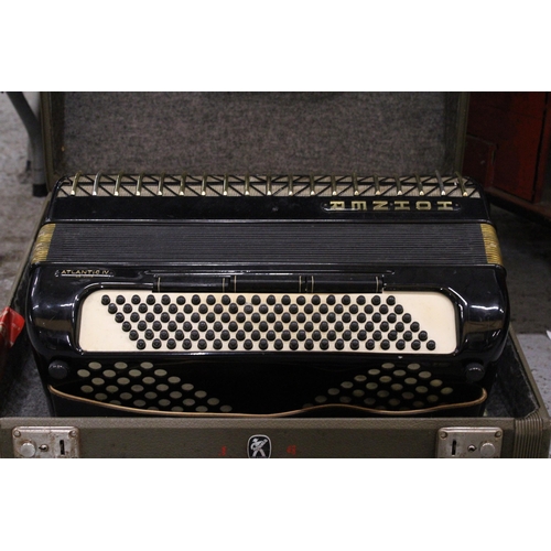 217 - A VINTAGE HOHNER ATLANTIC PIANO ACCORDIAN IN A CASE