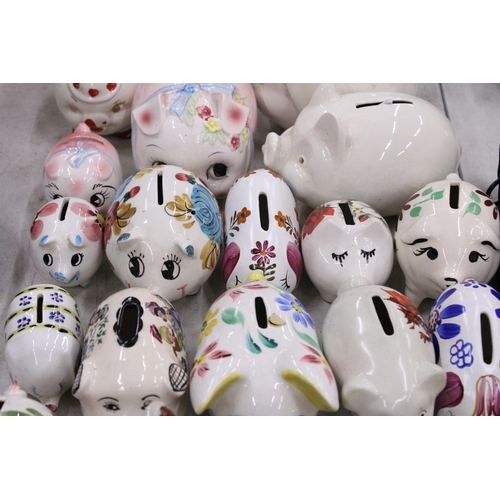 239 - TWENTY TWO VINTAGE CERAMIC PIGGY BANKS