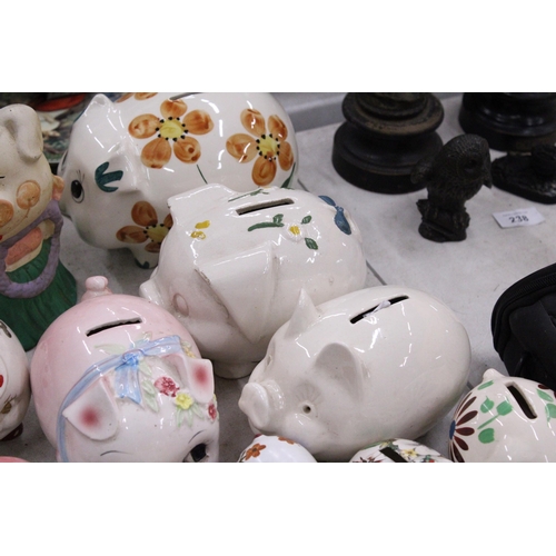 239 - TWENTY TWO VINTAGE CERAMIC PIGGY BANKS