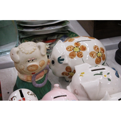 239 - TWENTY TWO VINTAGE CERAMIC PIGGY BANKS