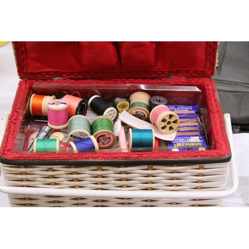 288 - A VINTAGE SEWING BASKET WITH CONTENTS