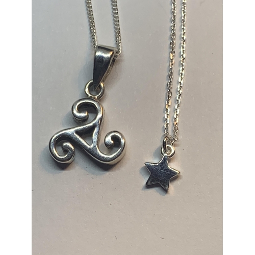 553 - FOUR MARKED SILVER NECKLACES WITH PENDANTS TO INCLUDE A YELLOW GOLD AND A ROSE GOLD PLATED