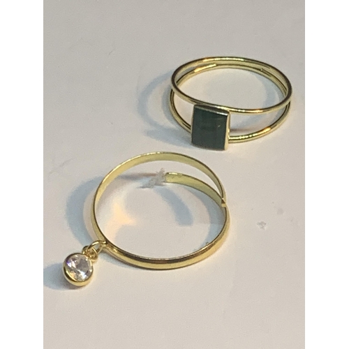 668 - FOUR MARKED SILVER RINGS TO INCLUDE TWO GOLD PLATED