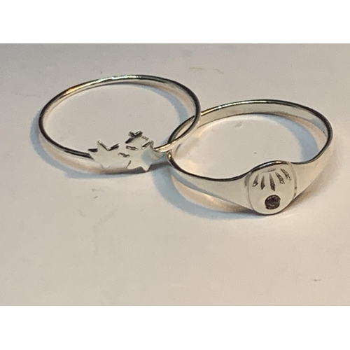 668 - FOUR MARKED SILVER RINGS TO INCLUDE TWO GOLD PLATED