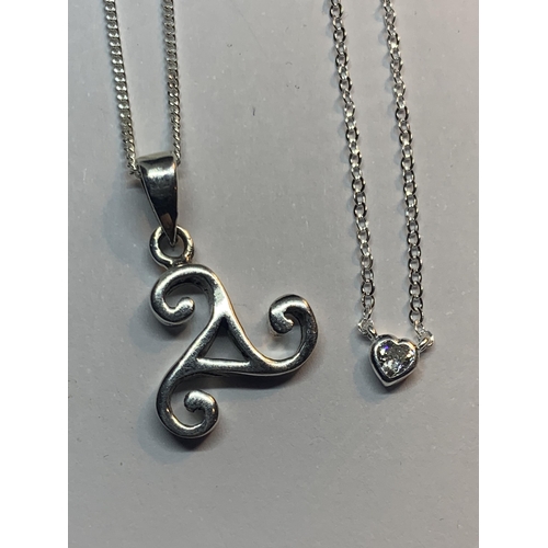 580 - FOUR MARKED SILVER NECKALCES WITH PENDANTS