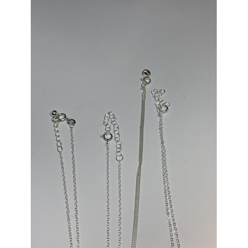 580 - FOUR MARKED SILVER NECKALCES WITH PENDANTS