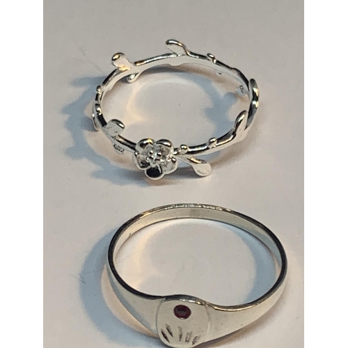 584 - FOUR MARKED SILVER RINGS