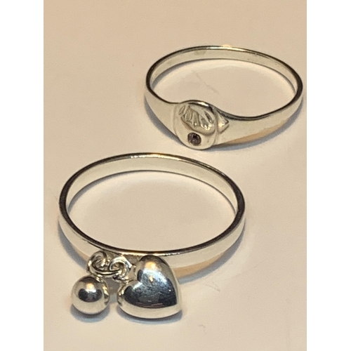 589 - FOUR MARKED SILVER RINGS