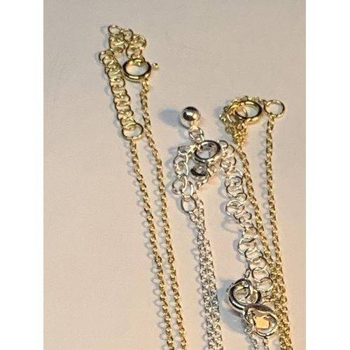 682 - FOUR MARKED SILVER NECKLACES WITH PENDANTS TO INCLUDE TWO GOLD PLATED