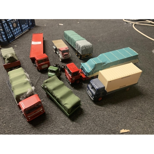 525 - FOUR CORGI, BRITISH ROAD SERVICES TRUCKS, A TRACTOR UNIT AND THREE TRAILERS, SOME WITH LOADS