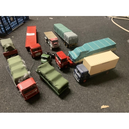 525 - FOUR CORGI, BRITISH ROAD SERVICES TRUCKS, A TRACTOR UNIT AND THREE TRAILERS, SOME WITH LOADS