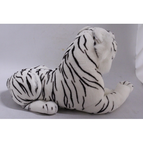 556 - A PLUSH WHITE TIGER TOY, GROWLS AND EYES LIGHT UP