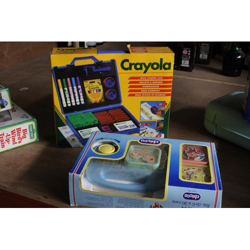 570 - SIX PRE-SCHOOL CHILDREN'S TOYS TO INCLUDE FISHER PRICE CASH REGISTER, SESAME STREET, BIG BIRD'S WIND... 