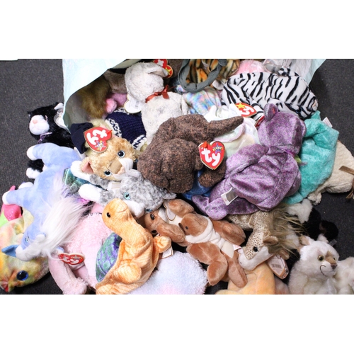 574 - A LARGE COLLECTION OF TY BEANIE BABIES