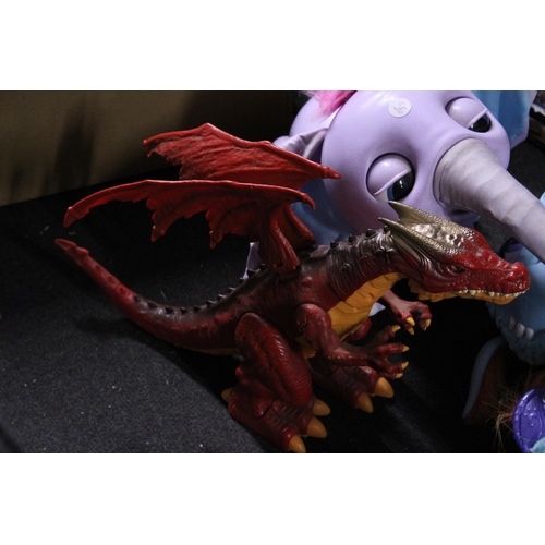 581 - FOUR LARGE TOY FIGURES TO INCLUDE TWO DRAGONS