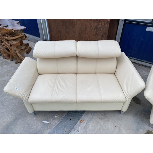 3054 - A CREAM LEATHER DROP-ARM THREE PIECE SUITE, COMPRISING EASY CHAIR, THREE SEATER SETTEE AND TWO SEATE... 