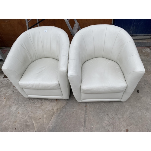 3055 - A PAIR OF CREAM LEATHER TUB CHAIRS BY NATUZZI GROUP