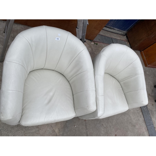 3055 - A PAIR OF CREAM LEATHER TUB CHAIRS BY NATUZZI GROUP