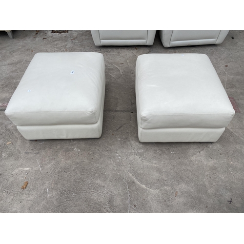 3056 - A PAIR OF CREAM LEATHER POUFFES