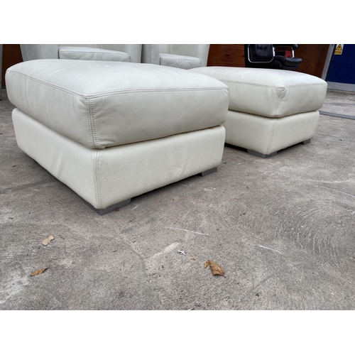 3056 - A PAIR OF CREAM LEATHER POUFFES