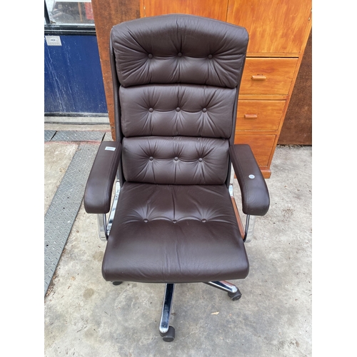 3057 - A FAUX LEATHER SWIVEL DESK CHAIR