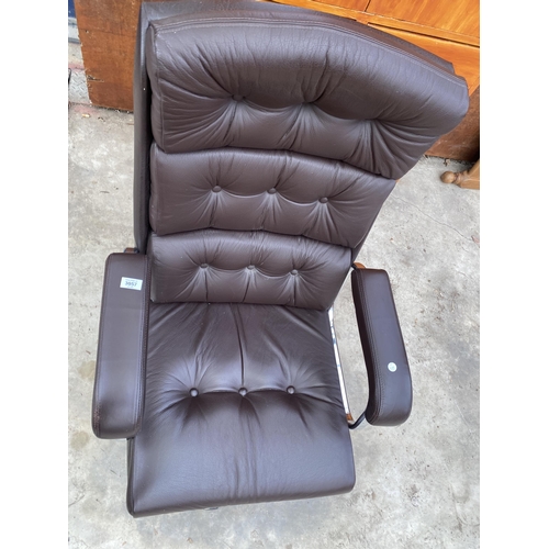 3057 - A FAUX LEATHER SWIVEL DESK CHAIR