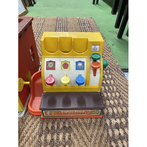 487A - THREE PRE-SCHOOL CHILDREN'S TOYS TO INCLUDE A FIRE STATION, CASH REGISTER AND TYPEWRITER