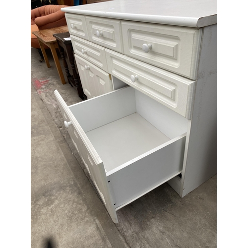 3066 - A WHITE CHEST OF SEVEN DRAWERS, 48CM