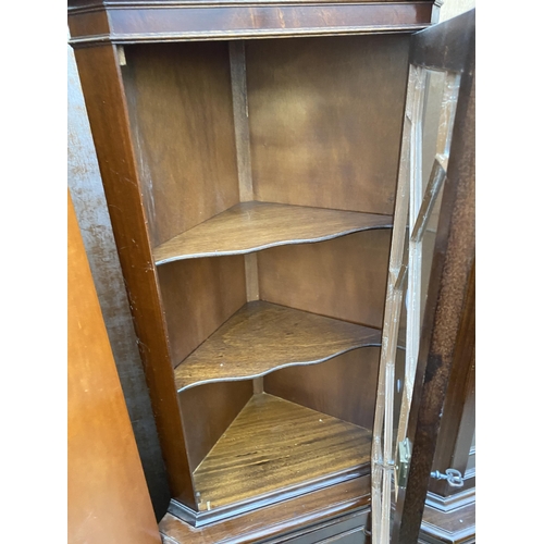 3076 - TWO MAHOGANY CORNER CUPBOARDS