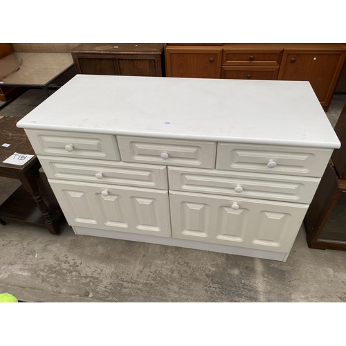 3066 - A WHITE CHEST OF SEVEN DRAWERS, 48CM