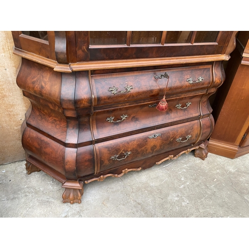 3074 - A CONTINENTAL WALNUT DISPLAY CABINET ON THREE DRAWER BOMBE BASE WITH CLAW FEET, 54