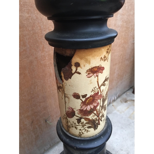 3084 - AN EBONISED PLANT STAND WITH CERAMIC COLUMN (A/F)