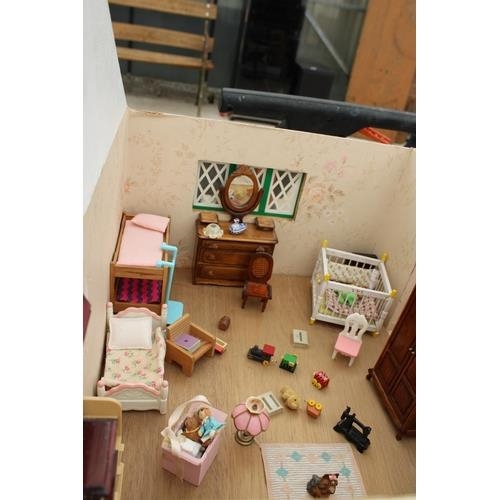 593A - A LARGE DOLLS HOUSE WITH BASE, FULLY FURNISHED WITH DETACHABLE ROOF AND FRONT PANEL