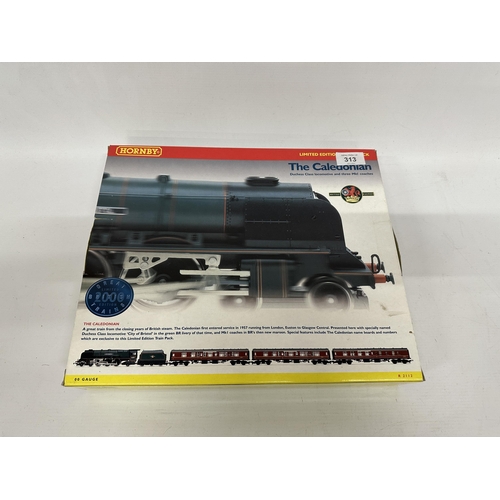 313 - A HORNBY OO GAUGE TRAIN SET - 'THE CALEDONIAN' (R2112) TO INCLUDE ADUCHESS CLASS LOCOMOTIVE AND THRE... 