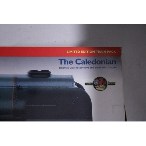 313 - A HORNBY OO GAUGE TRAIN SET - 'THE CALEDONIAN' (R2112) TO INCLUDE ADUCHESS CLASS LOCOMOTIVE AND THRE... 