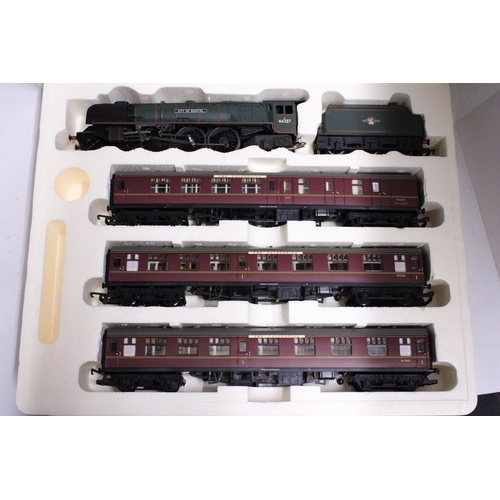 313 - A HORNBY OO GAUGE TRAIN SET - 'THE CALEDONIAN' (R2112) TO INCLUDE ADUCHESS CLASS LOCOMOTIVE AND THRE... 