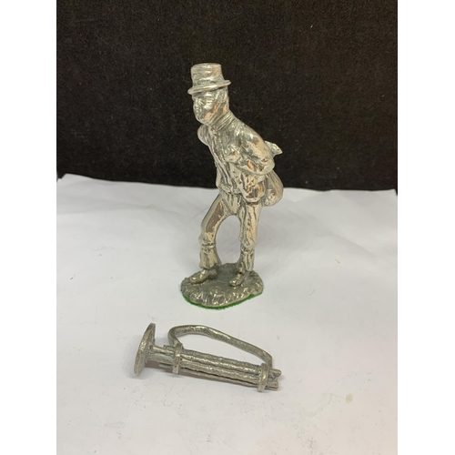 47 - FOUR SILVER PLATED ITEMS TO INCLUDE AN 18TH CENTURY BURGLAR, TWO CUTLERY RESTS