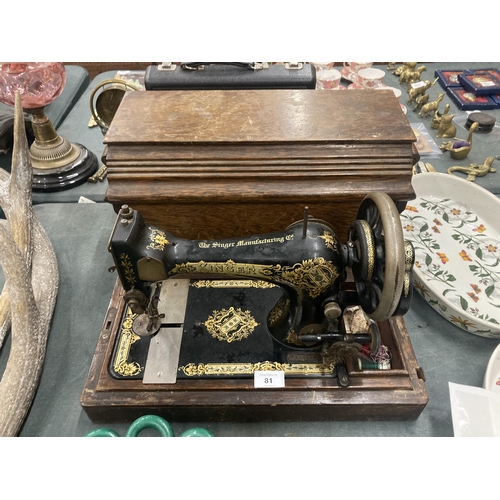 81 - A VINTAGE SINGER SEWING MACHINE WITH CASE