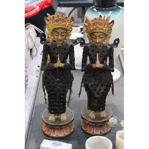 212 - A PAIR OF BALINESE TRIBAL FIGURES ON WOODEN LOTUS THRONES THEIR BODIES CONSTRUCTED FROM CHINESE COIN... 