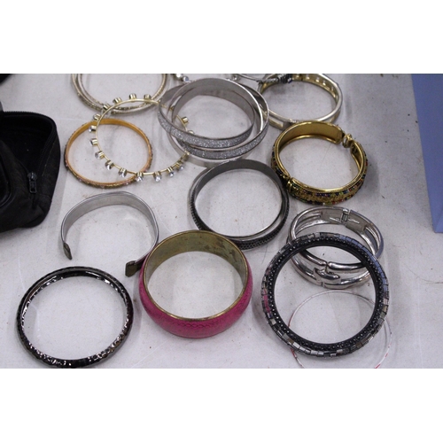 236 - A LARGE COLLECTION OF WHITE METAL BRACELETS BANGLES WITH STONES