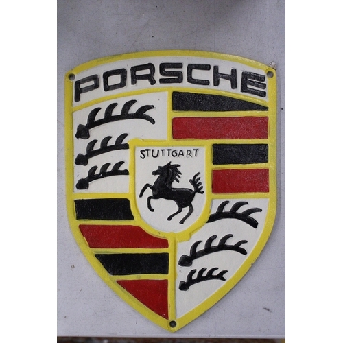 261 - A CAST PORSCHE SIGN, 21CM X 28CM