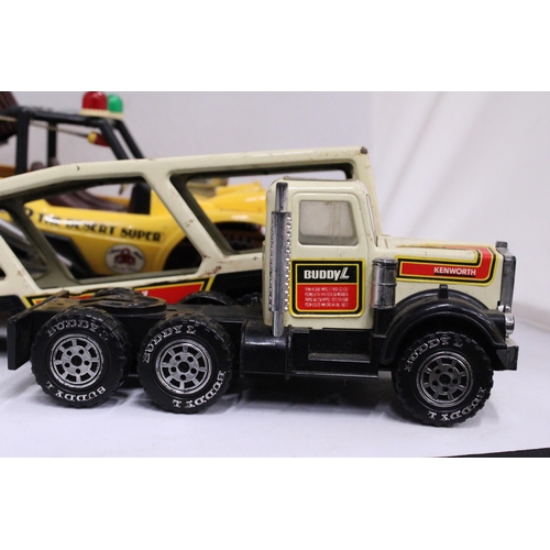 370 - A LARGE VINTAGE TIN PLATE BUDDY L CAR TRANSPORTER TRUCK PLUS A 1970'S KUANG MEI BATTERY OPERATED BEA... 