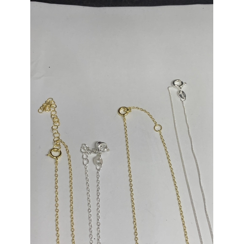 624 - FOUR MARKED SILVER NECKLACES WITH PENDANTS TWO BEING GOLD PLATED