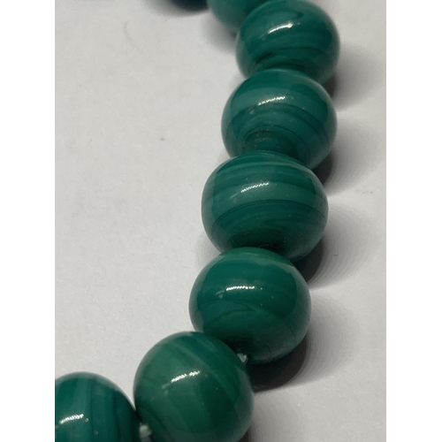 650 - A POSSIBLY JADE NECKLACE (ONE BEAD A/F)