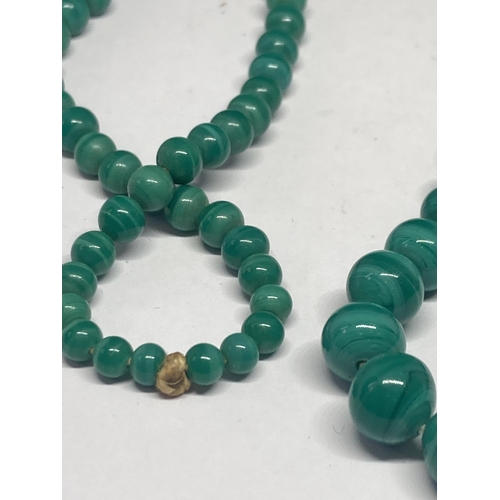 650 - A POSSIBLY JADE NECKLACE (ONE BEAD A/F)