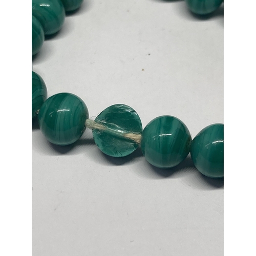 650 - A POSSIBLY JADE NECKLACE (ONE BEAD A/F)