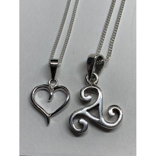 670 - FOUR MARKED SILVER NECKLACES WITH PENDANTS TO INCLUDE TWO GOLD PLATED